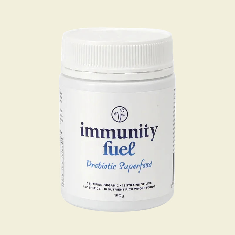 A container of Immunity Fuel Probiotic Superfood, with a white background and label displaying the product name and 'Certified Organic' text, along with images of various organic ingredients.