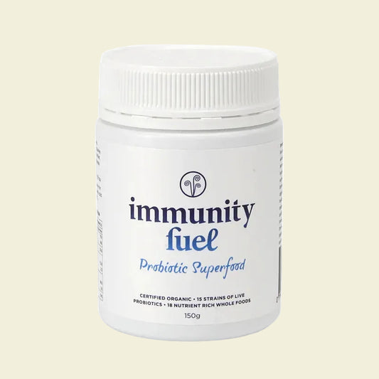 A container of Immunity Fuel Probiotic Superfood, with a white background and label displaying the product name and 'Certified Organic' text, along with images of various organic ingredients.